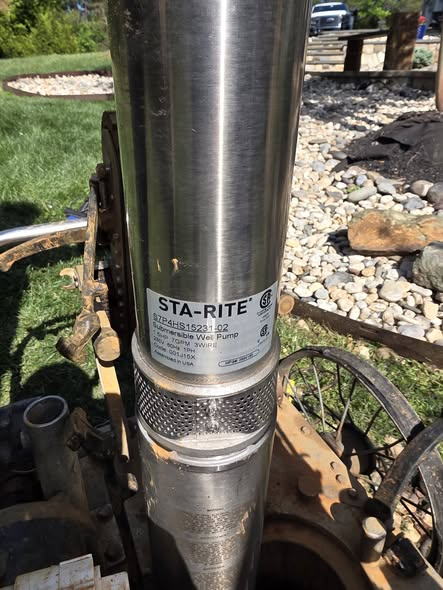 Sta-Rite submersible well pump at the well opening